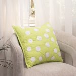 Amity home dottie pillow in lime   quilted polka dot design