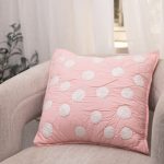 Amity home dottie pillow in pink   textured polka dot design