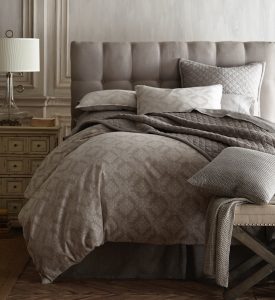 Amity home dawson french ikat duvet cover   grey luxury bedding with a subtle woven ikat pattern styled on a plush bed