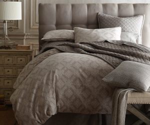 Amity home dawson french ikat duvet cover   grey luxury bedding with a subtle woven ikat pattern styled on a plush bed