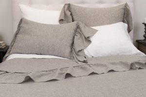 Amity home caprice duvet cover   grey chambray duvet cover and shams with ruffled edges on a styled bed