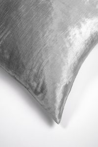 Amity home lia rayon velvet duvet cover   close up of limestone grey fabric highlighting soft shimmering crushed velvet texture