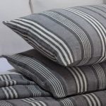Amity home langston linen duvet cover   close up of grey linen bedding with white stripes showing woven texture
