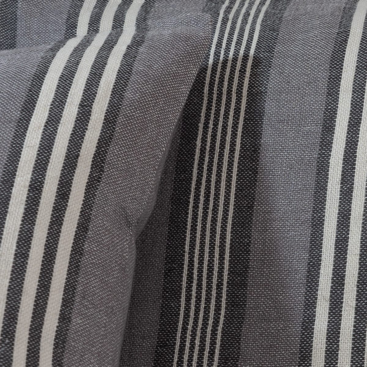 Amity home linen duvet cover   close up of grey and off white woven fabric with varied vertical stripes showing linen texture