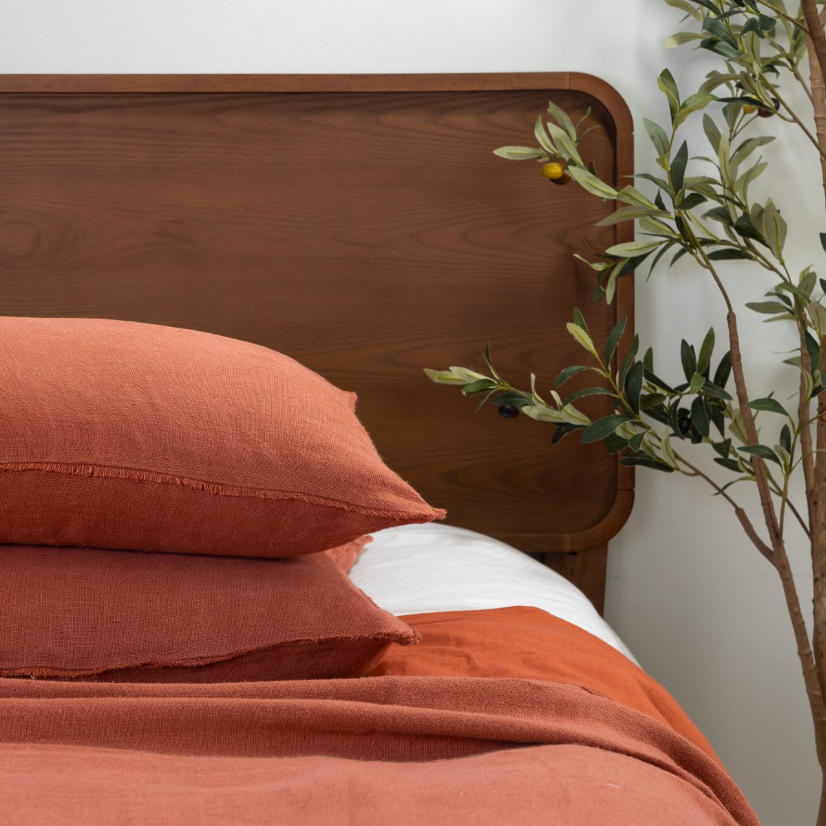 Amity home ranier linen duvet cover in burnt sienna   frayed edge detail