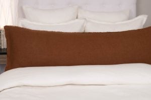 Amity home ranier linen body pillow in saddle   frayed edge detail