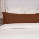 Amity home ranier linen body pillow in saddle   frayed edge detail