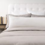 Amity home ranier linen body pillow in ivory   frayed edge detail