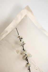 Amity home murano duvet cover in ivory   button closure detail