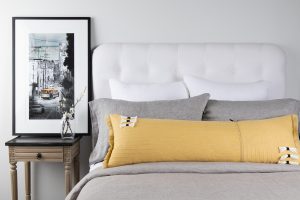 Amity home cambria bolster in ochre   decorative tassels