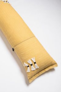 Amity home cambria bolster in ochre   striped texture  tassels