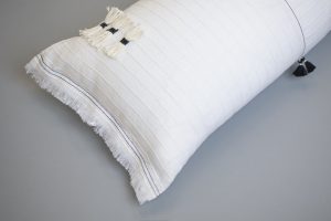 Amity home cambria bolster in white   fringed edges