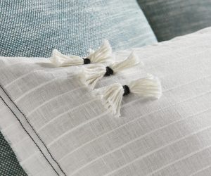 Amity home cambria bolster in white   decorative tassels