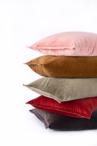 Amity home tahoma duvet cover in brick   stacked velvet pillows