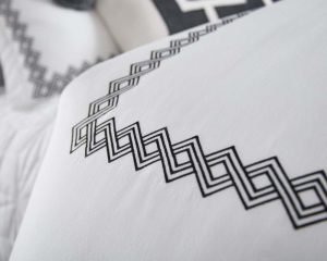 Amity home victoria  amalfi collection in white with black embroidery   geometric embroidered border