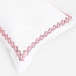Amity home amalfi duvet cover in white with coral   interlocking border embroidery