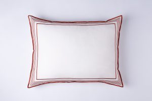 Amity home nell sham in brick  white   tailored embroidered border