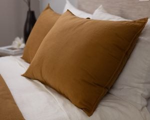 Amity home baker duvet in ochre   relaxed linen texture