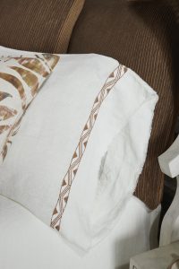 Amity home treva sheet set camel   white linen with geometric embroidery  frayed edge