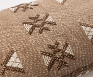 Amity home zarina bolster in camel   embroidered geometric pattern