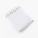 Amity home bellagio sheet set in white with petal pink   chain link embroidery