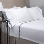 Amity home turin sheet set in white   peacock teal embroidered border