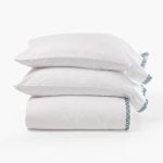 Amity home turin sheet set in white   teal geometric embroidery