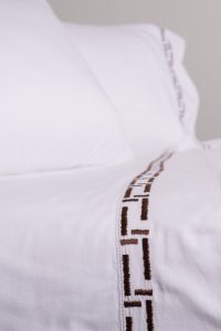Amity home ellis sheet set in white with saddle   geometric embroidered border