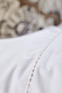 Amity home talo sheet set in oyster   delicate dotted embroidery