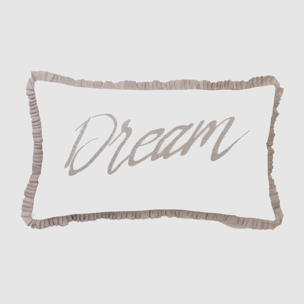 Cc910lb | Amity Home Decorative white pillow with beige ruffled edges and the word dream in cursive centered on the front