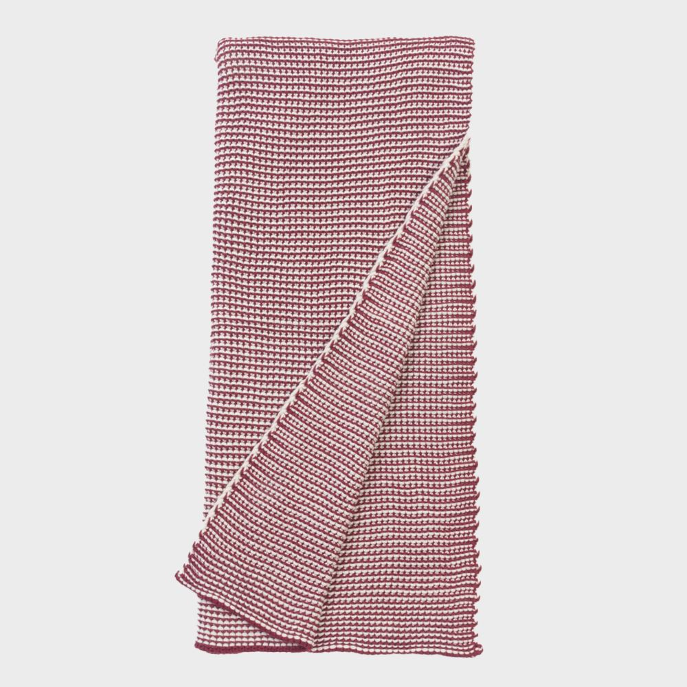 Kd1000rth | Amity Home Red and white striped towel neatly folded with a corner lifted to show the weave tail end