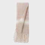 Soft blush pink scarf with cream stripes and fringe at the ends folded vertically