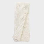 Cream chunky knit scarf folded with a cable pattern on a light background
