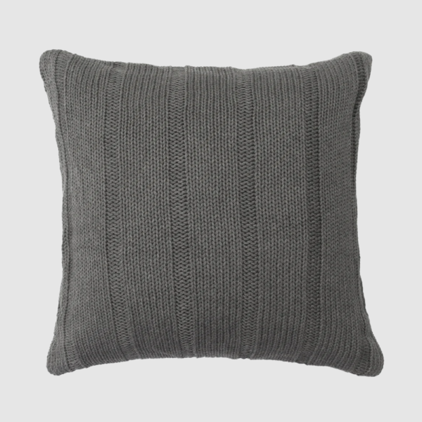Gray knitted cushion pillow with vertical ribbed texture against a light background decorative throw pillow