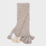 Beige chunky knit scarf with cream tassels at both ends draped in a loop