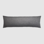 Charcoal gray rectangular throw pillow with textured fabric on a light background