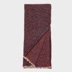 Maroon woven scarf folded with fringed ends visible at the bottom edge