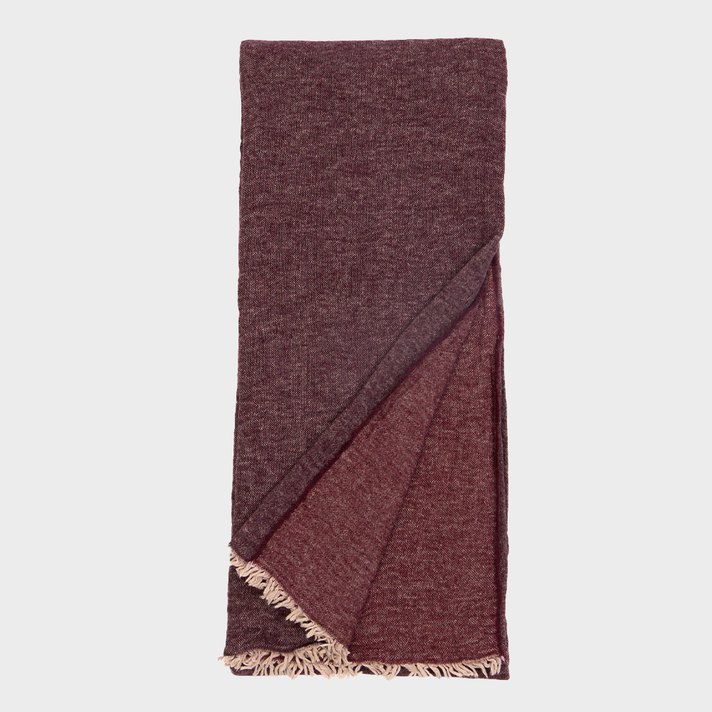 Gavin | Amity Home Maroon woven scarf folded with fringed ends visible at the bottom edge