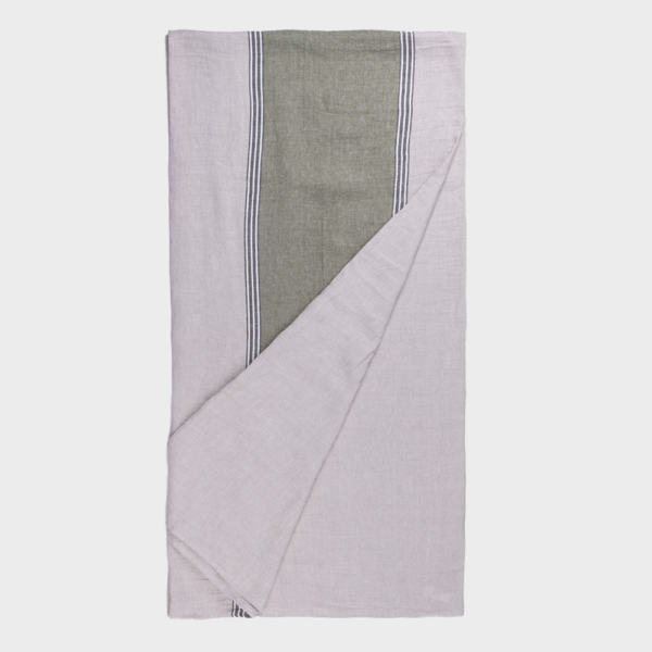 Folded lavender throw with olive-green center panel and white striped border.