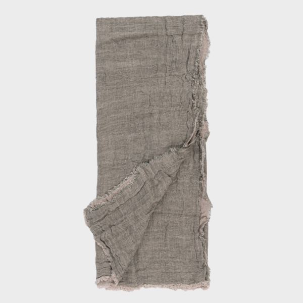 Folded light gray scarf with frayed edges, laid flat against a pale background.