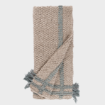 Beige woven scarf with blue gray stripes and fringed ends folded diagonally across the image