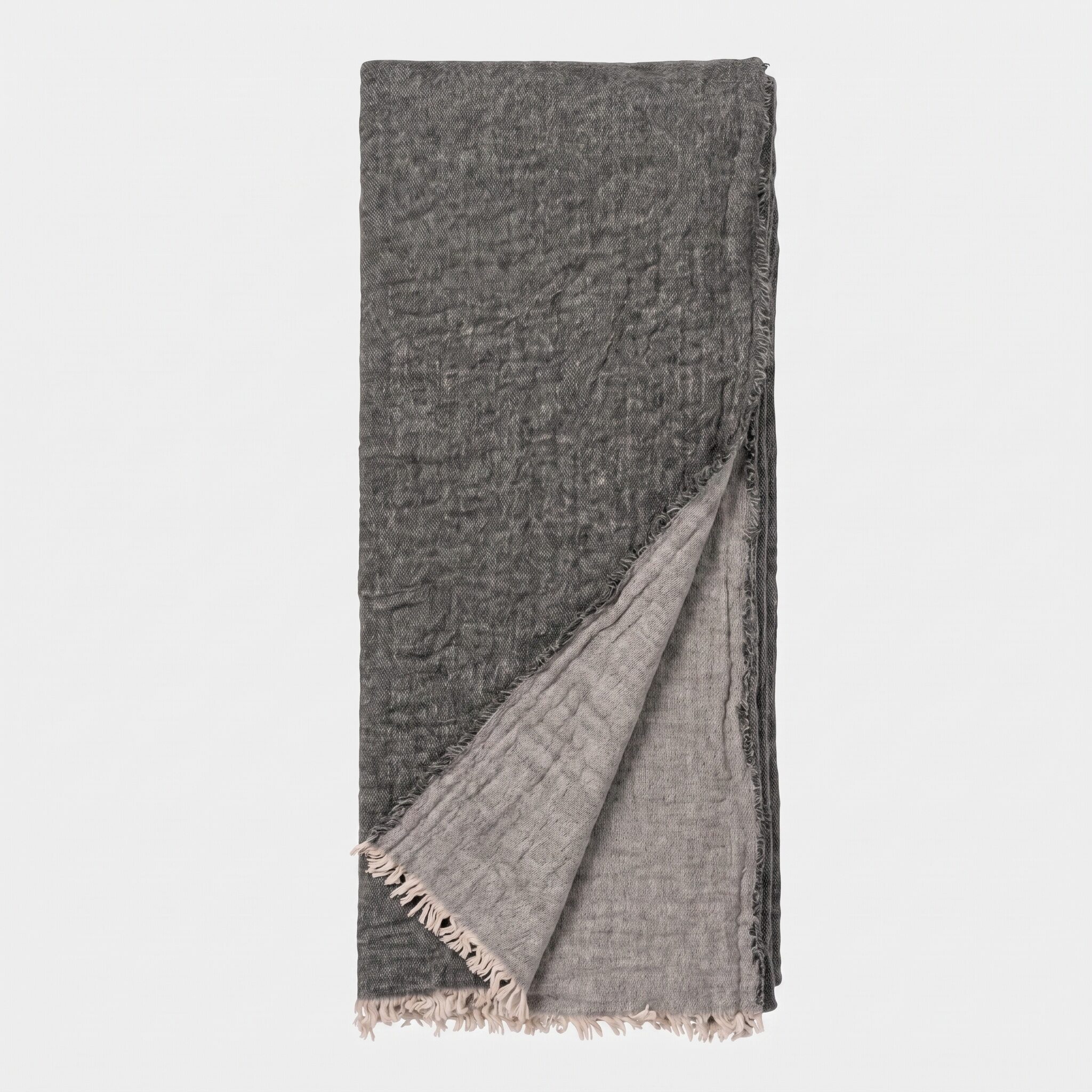Vd101asth 1 | Amity Home Folded dark gray scarf with fringed edges against a white background
