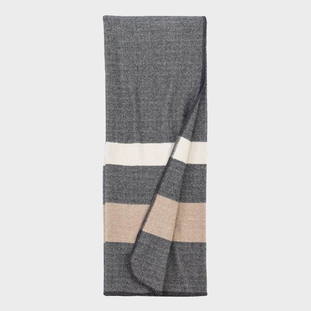 Ea105csth | Amity Home Folded grey throw blanket with white and beige stripes showing a textured herringbone pattern