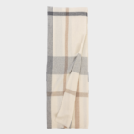 Cream and gray plaid scarf folded with tan stripes soft woven texture