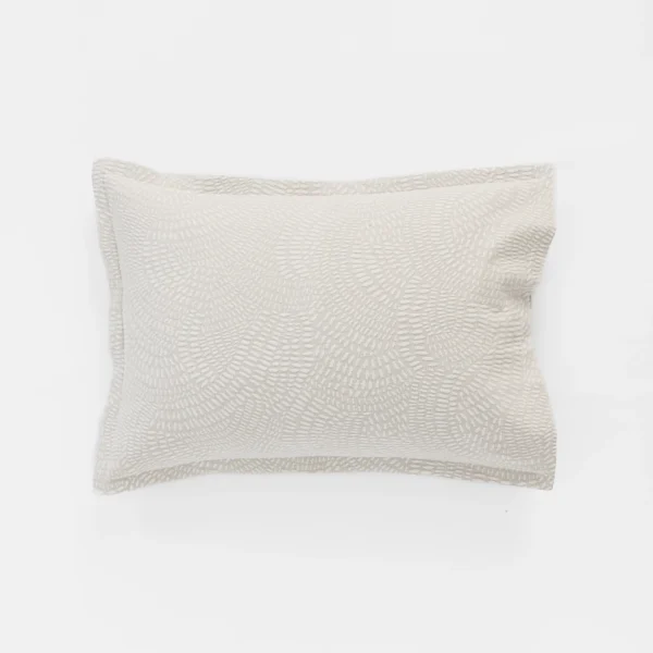 Beige textured decorative pillow with a subtle woven pattern on a white background