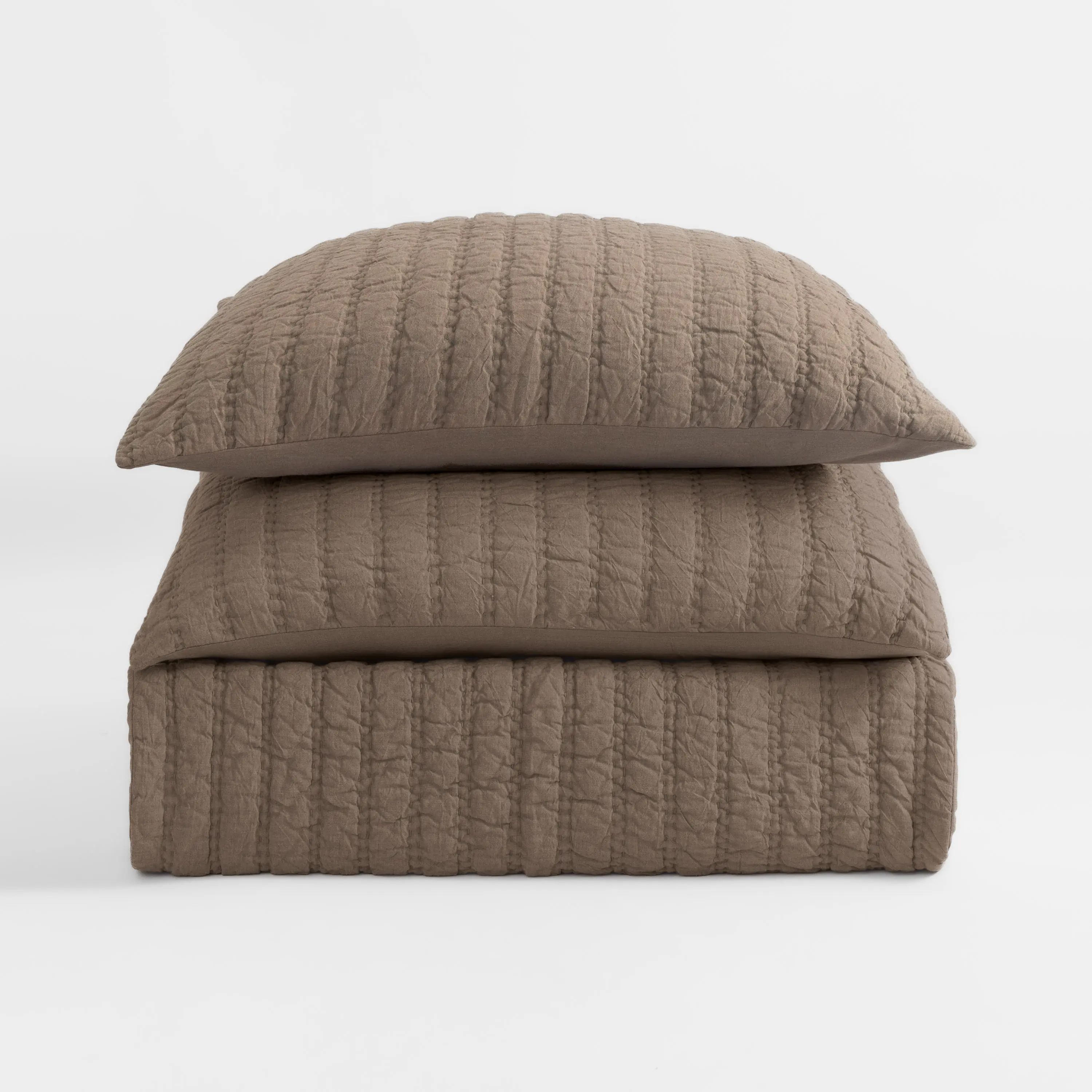 Cc1154hstk25 | Amity Home Stack of two taupe quilted pillows with a textured stitched pattern against a light background