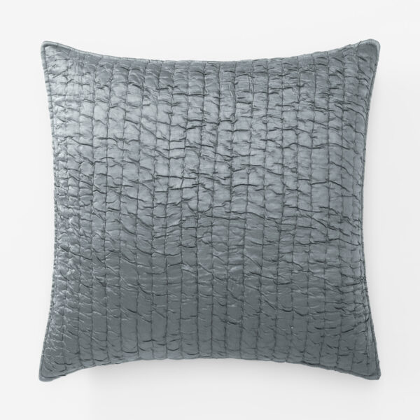Grey quilted decorative pillow with a grid like stitched pattern on a white background
