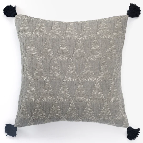 Gray decorative throw pillow with a subtle triangle pattern and dark tassels at the four corners on a white background