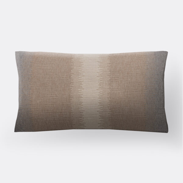 Close up of a brown textured throw pillow on a white background showing a soft woven fabric with subtle horizontal lines