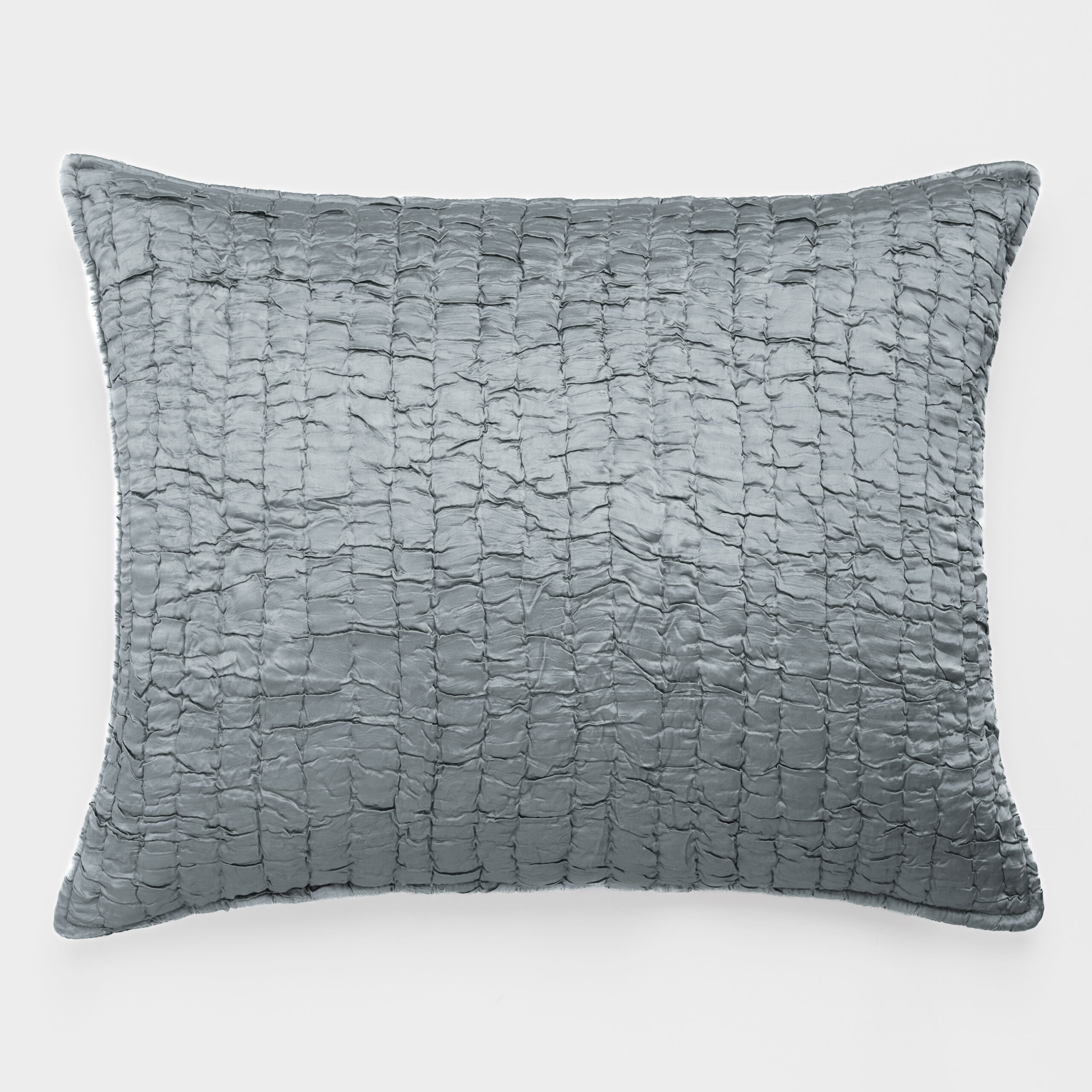 Cc776shdes2 | Amity Home Close up of a large gray quilted pillow with a textured gridlike pattern on a light background
